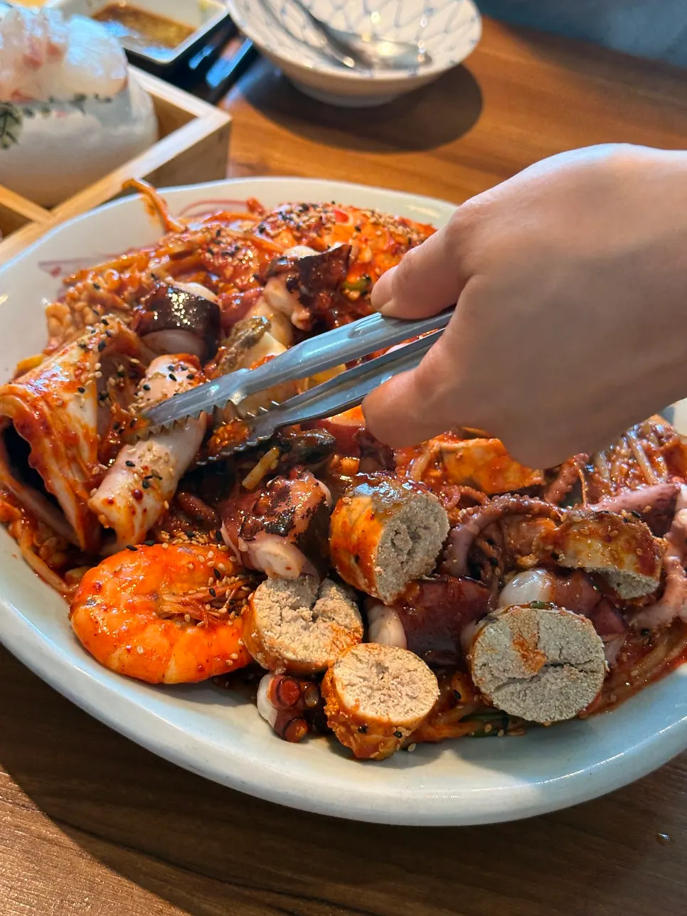 Firm octopus visible in the seafood stew
