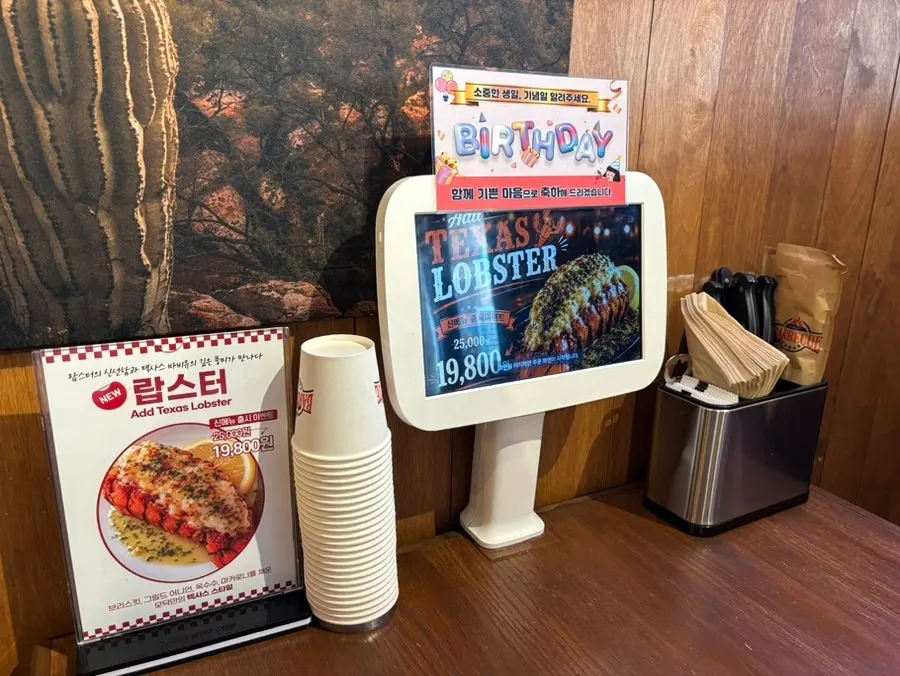 Menu board showing platter sets and course options