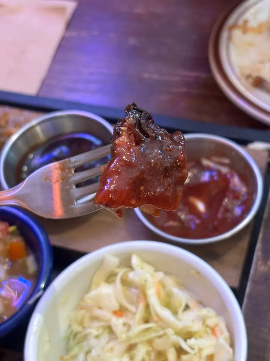 Spare ribs served with barbecue sauce