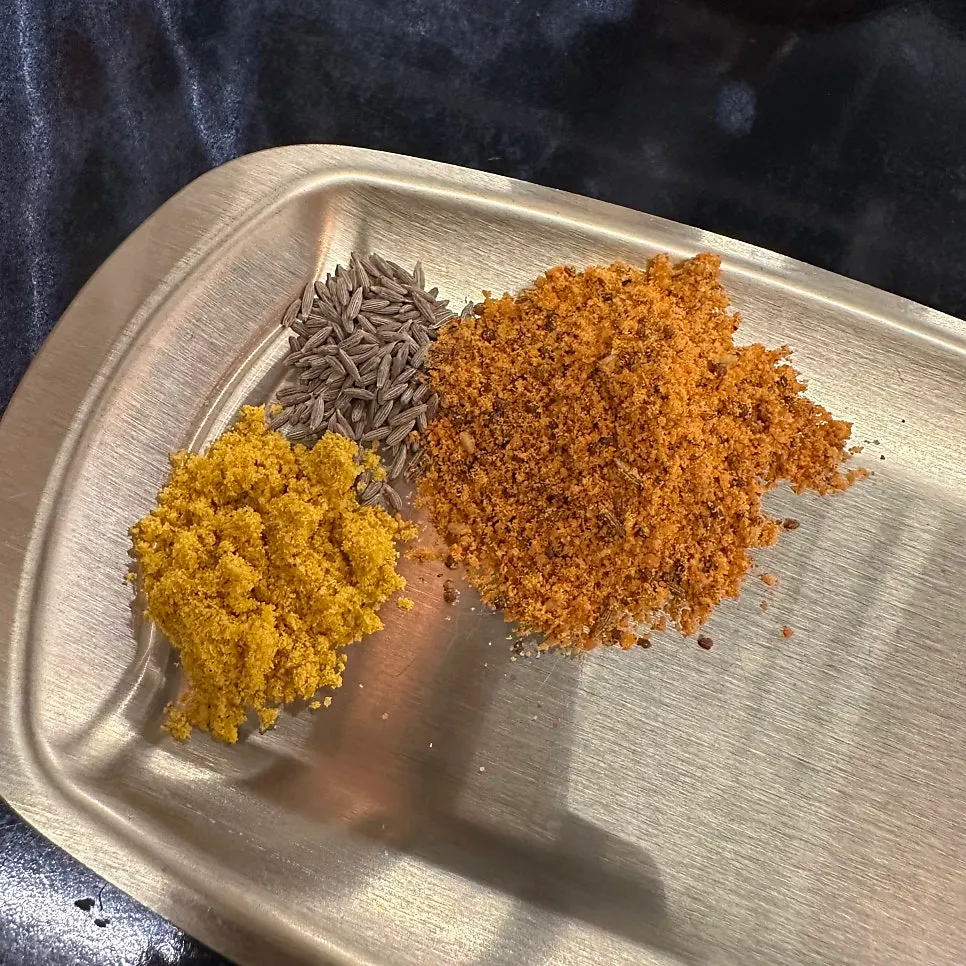 Lamb skewer seasoning powders portioned onto a small plate