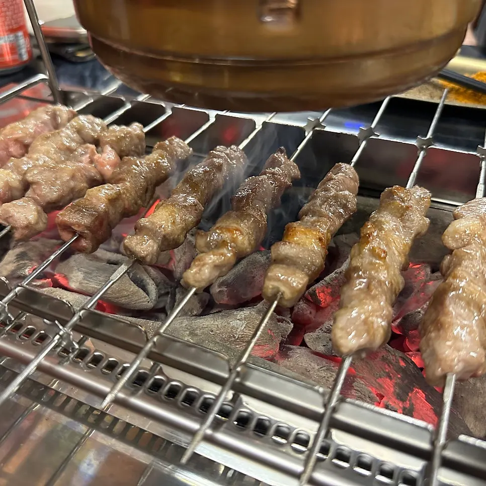 Eight thick lamb skewers threaded with generous meat
