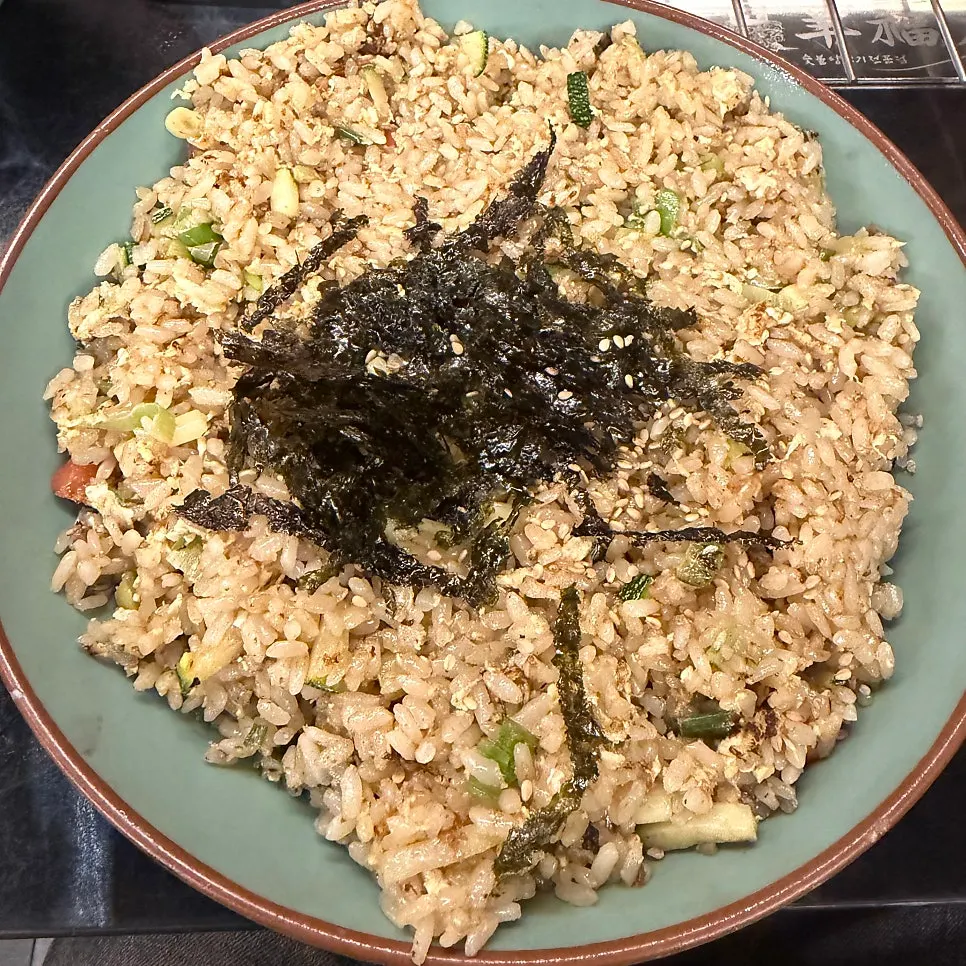 Fluffy egg fried rice served at the table