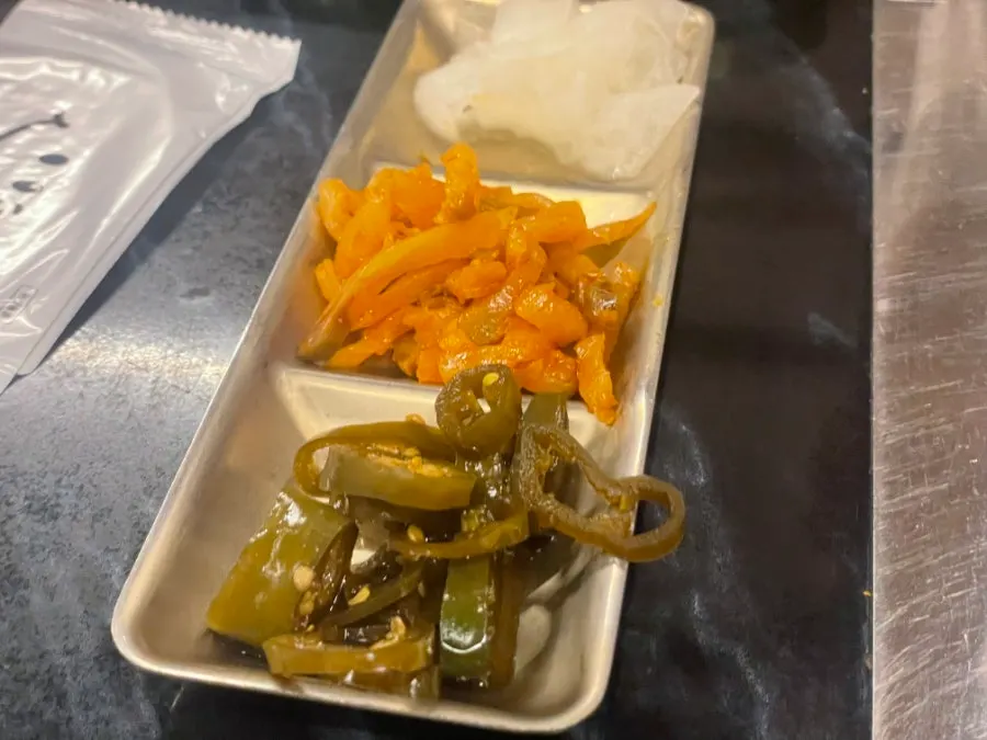 Basic side dishes: pickled mustard greens and seasoned chili