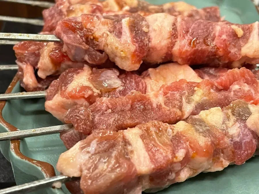 Fresh lamb skewers before grilling