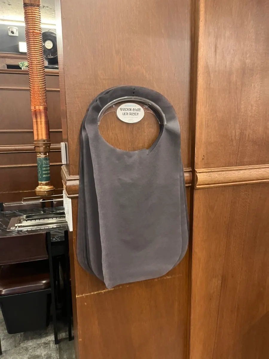Aprons and a high chair set up on one side of the restaurant