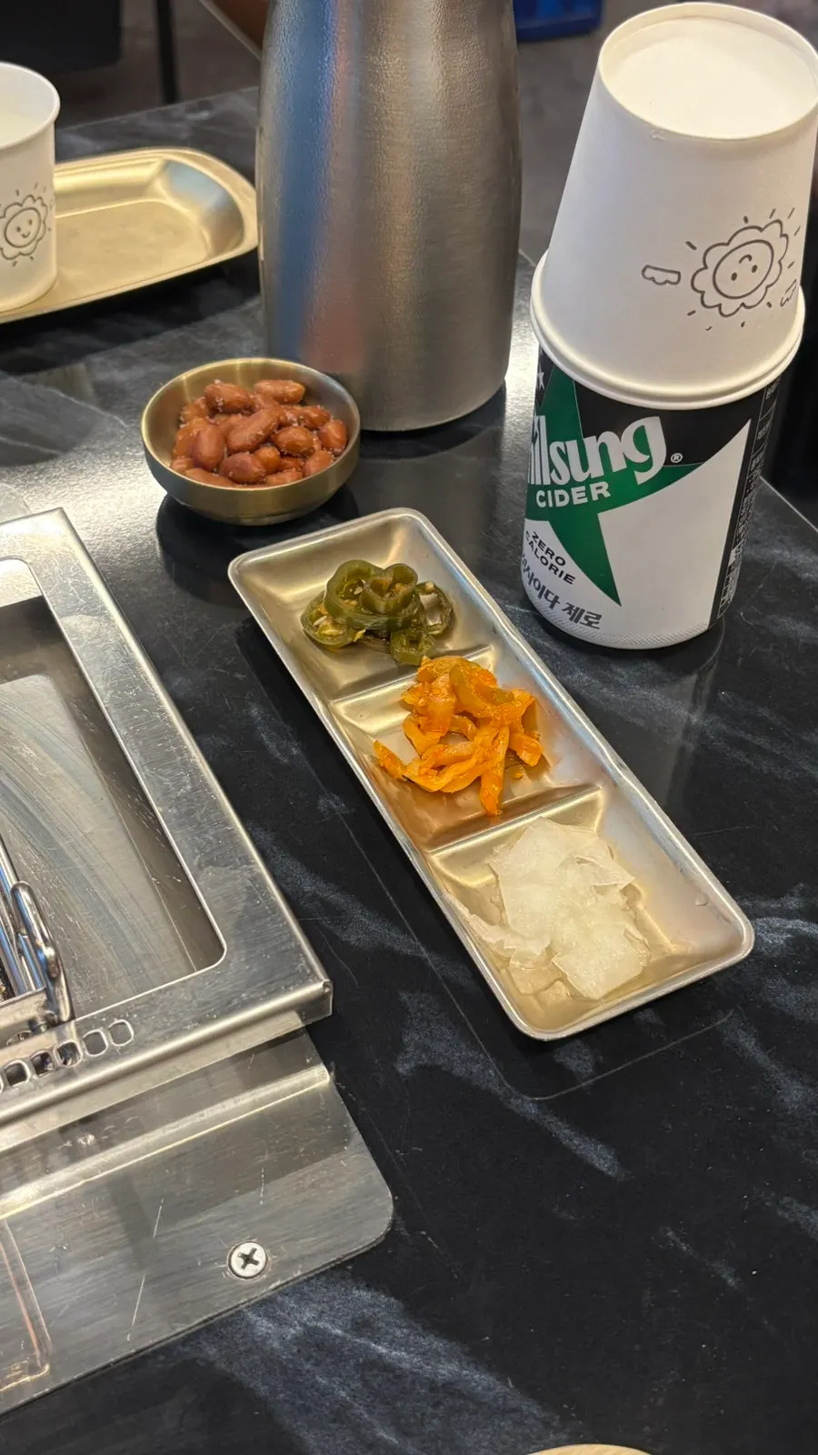 Basic table setting with seasoning containers for lamb skewers