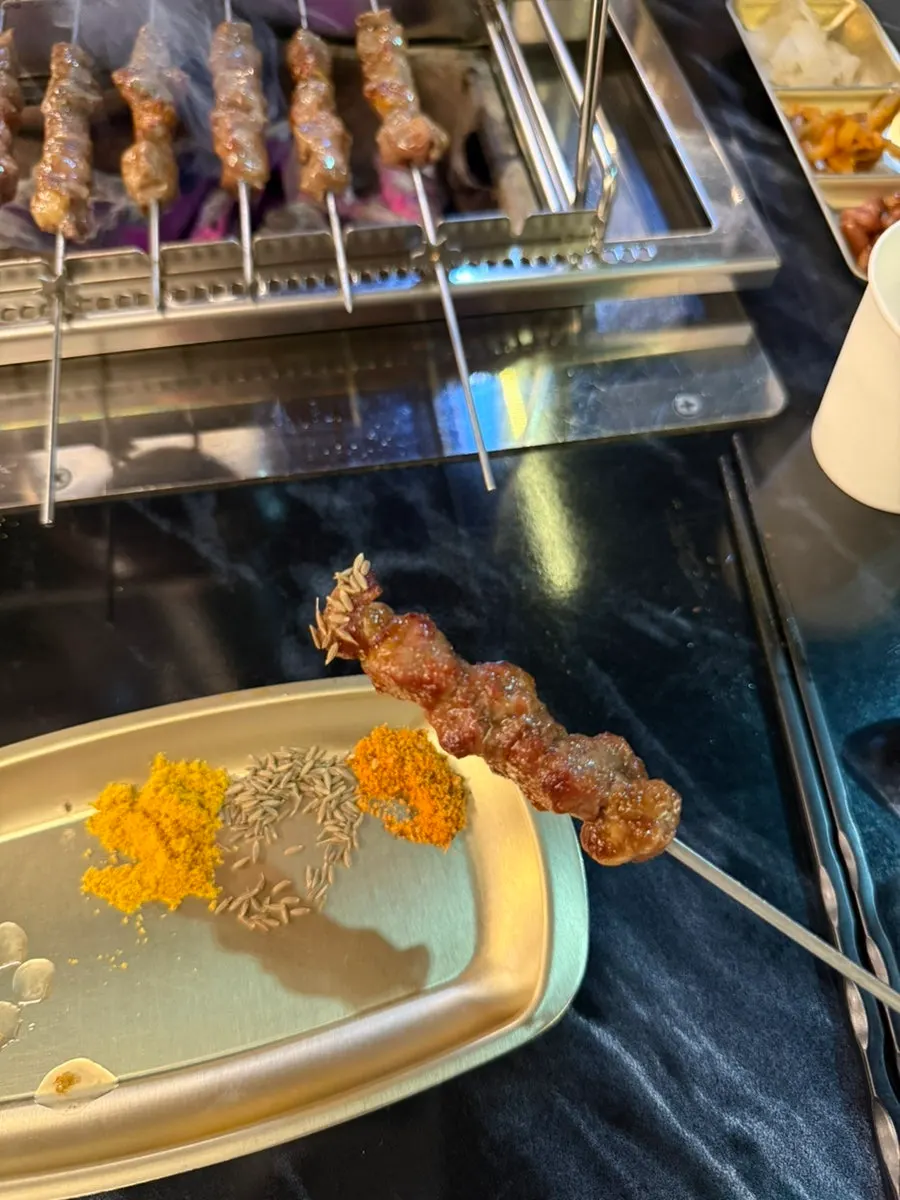 Yangdeungsim skewer dipped in cumin powder