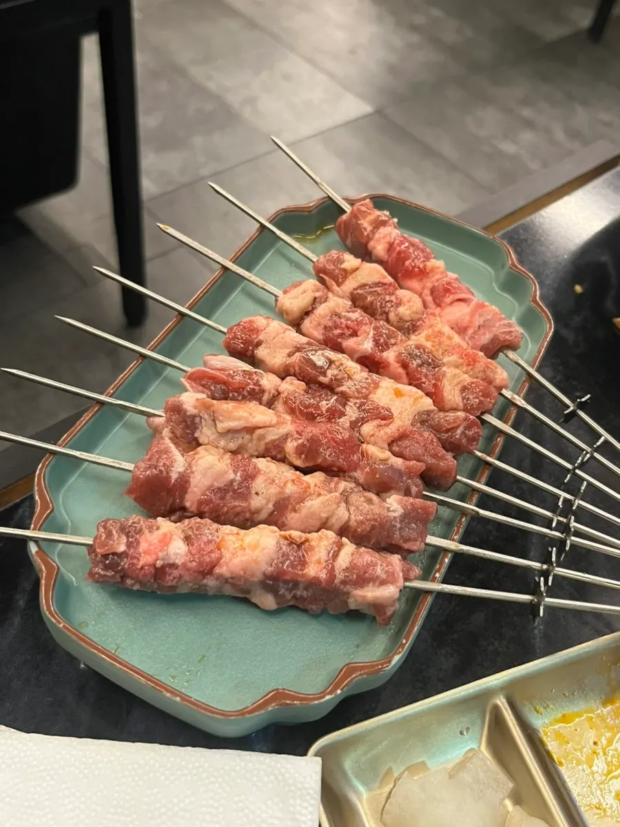 Cross-section of a thick lamb skewer