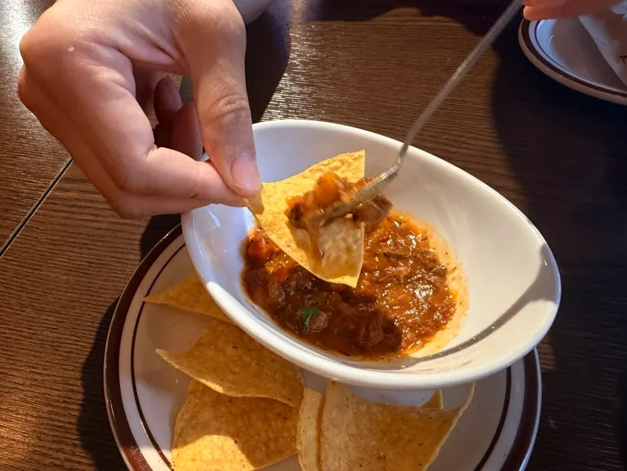 Complimentary nachos and sauce