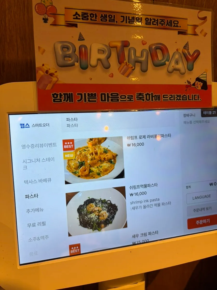 Menu board listing pasta dishes