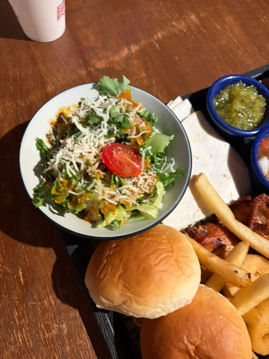Salad and tortillas served with the platter