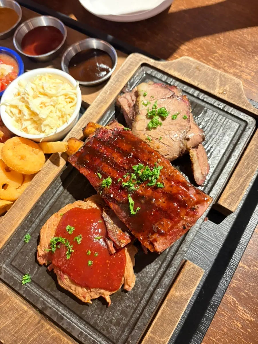 Platter with brisket, spare ribs, and pulled pork
