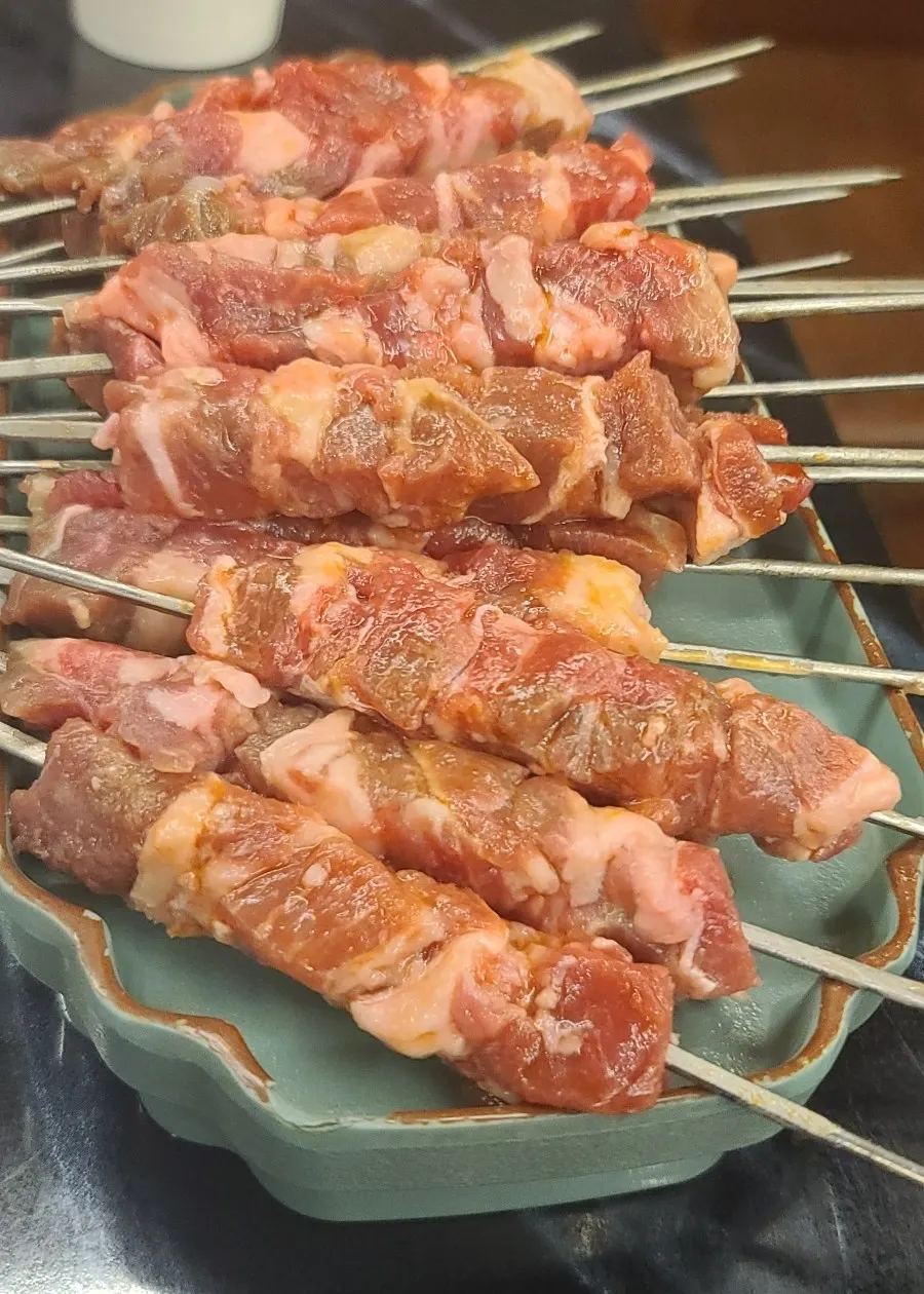 Two servings of Yangbokjeom giant lamb skewers