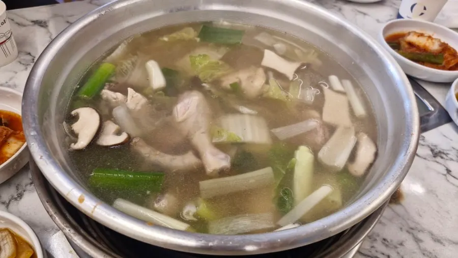 Pot of dak hanmari bubbling on the boil