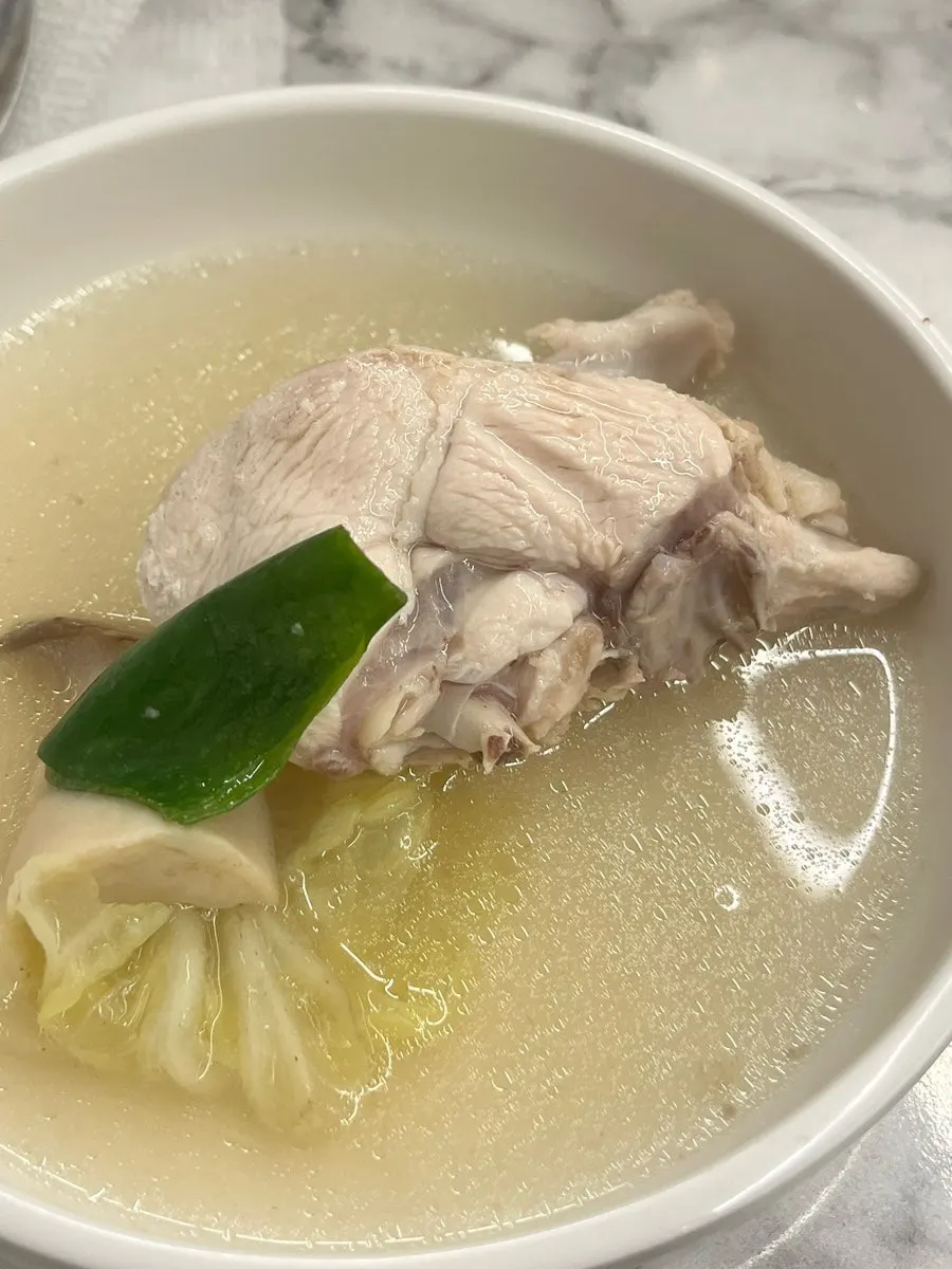 Chicken and vegetables cooking in the pot