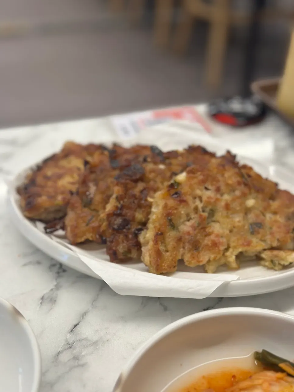 A plate of meat meatballs ordered as a side