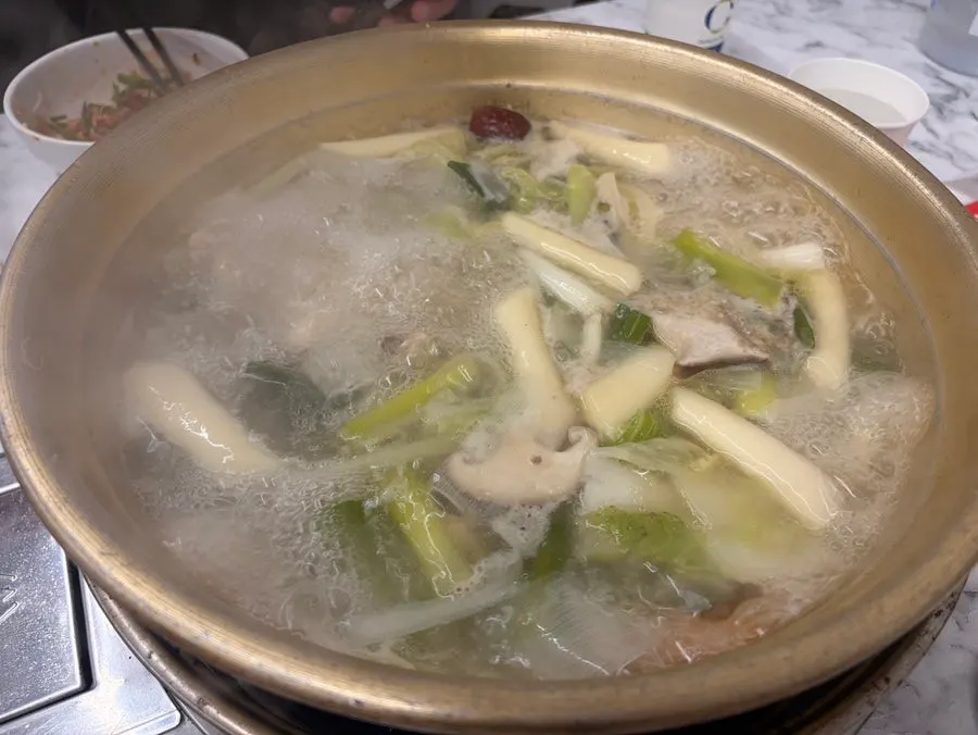 Dak hanmari broth with chicken, potato, and green onion
