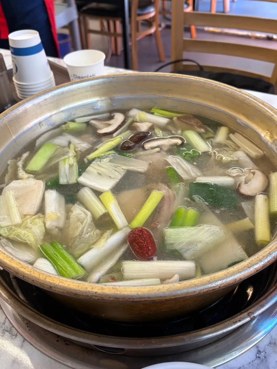 Dak hanmari pot simmering on the table
