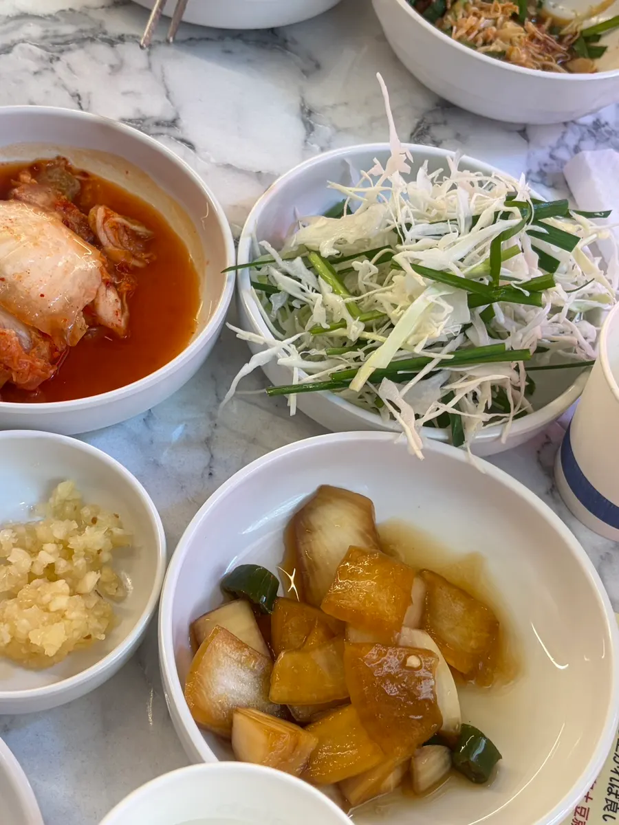 Self-served pickled onion, chili and kimchi