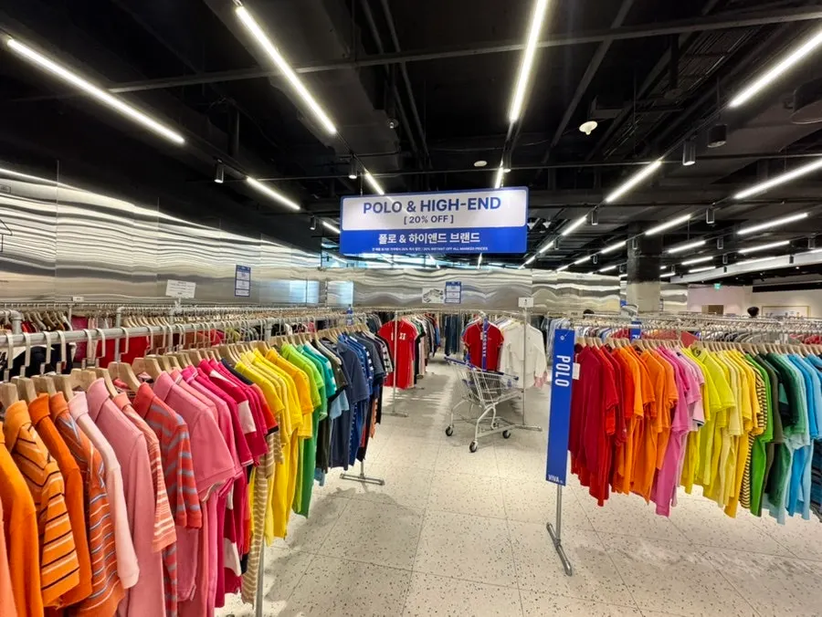 Clothing racks split into domestic and international brand sections