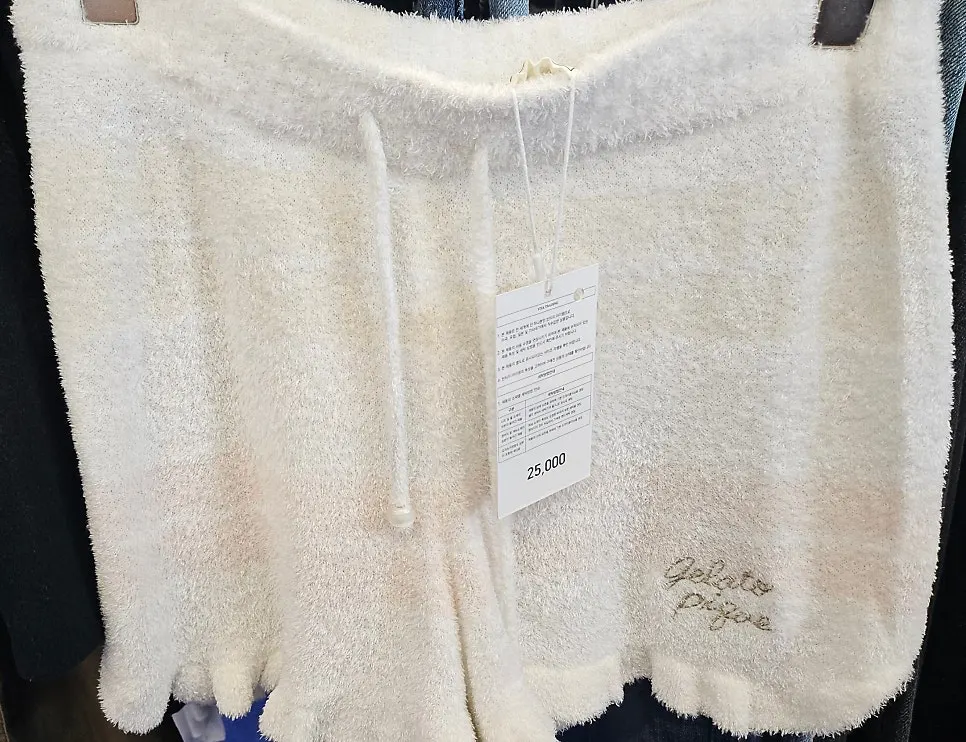 Price tags and discount markings on vintage clothing