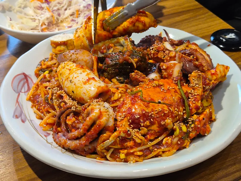 Seafood jjim ingredients prepped by staff