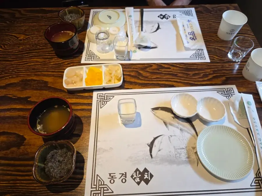 Basic side dishes with miso soup, rice porridge, and yam juice