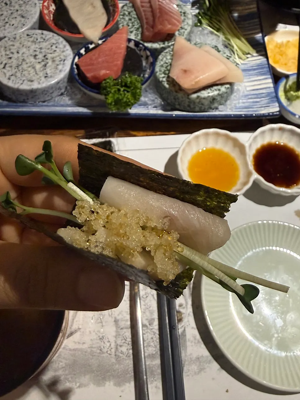 Tuna sashimi with accompanying sauces