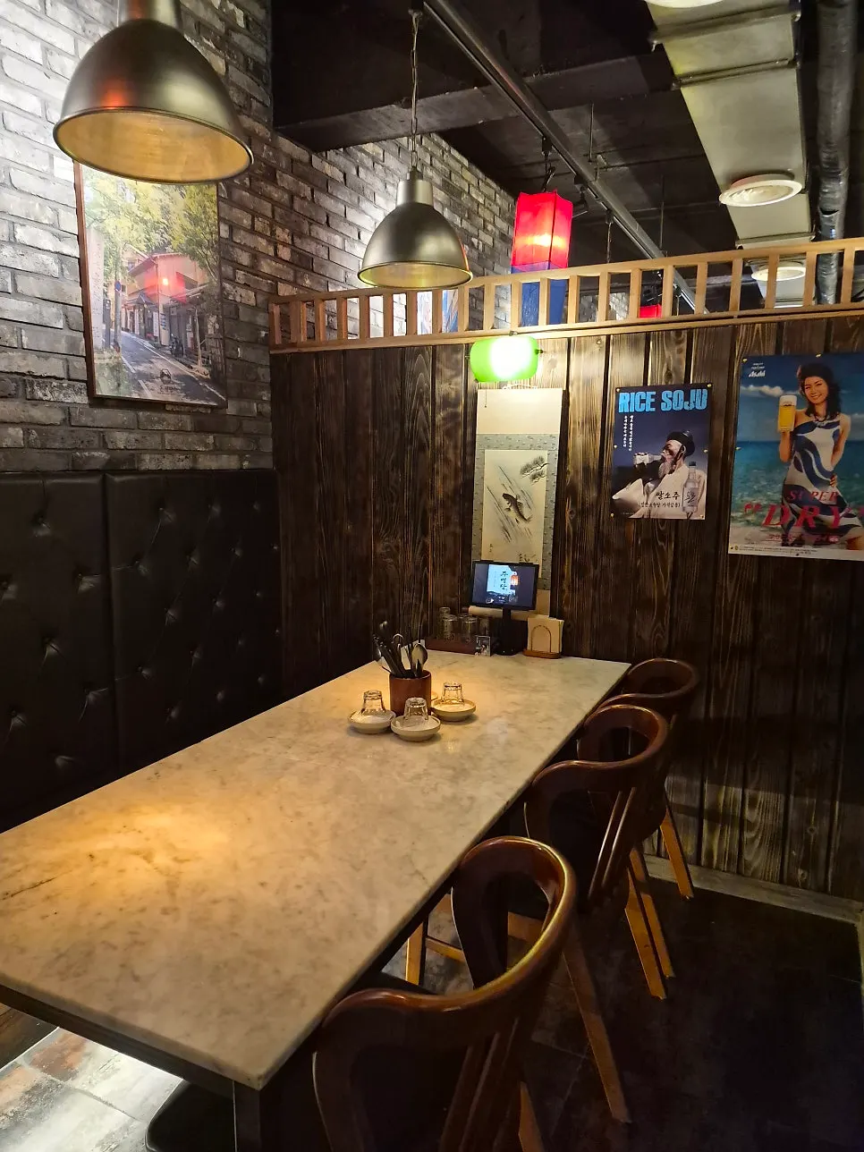 Wall with retro posters and character pictures