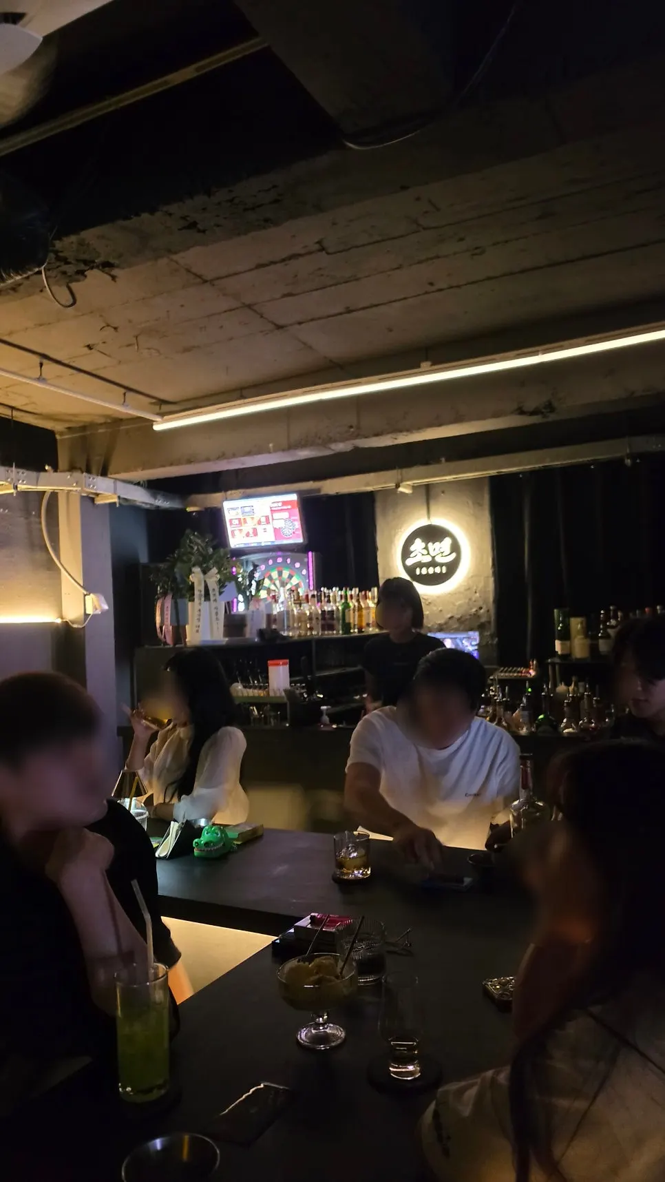 Chomyeon interior with guests at night