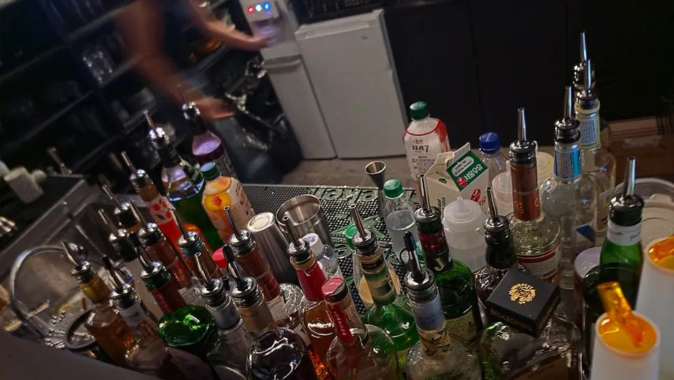 Bar with many kinds of liquor on display