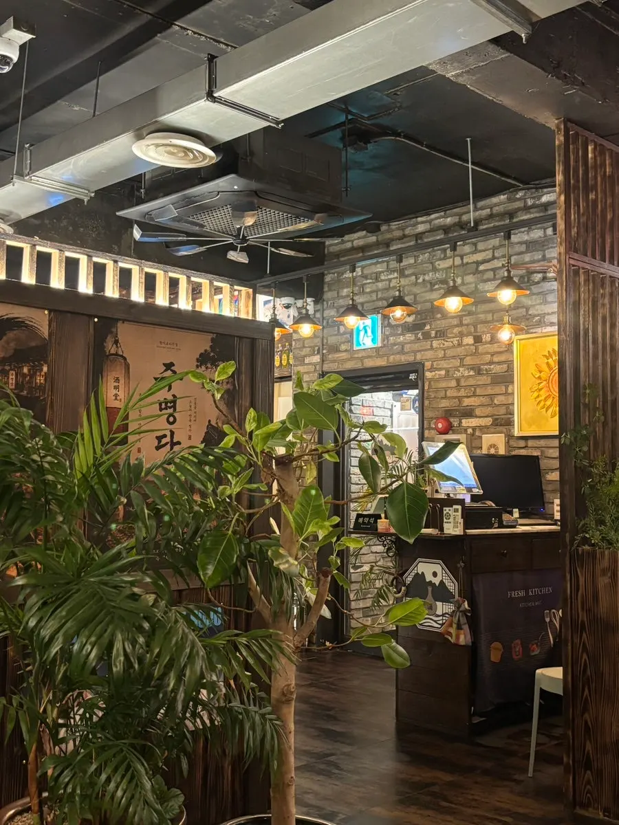 Ju Myeongdang interior with brickwork and lighting