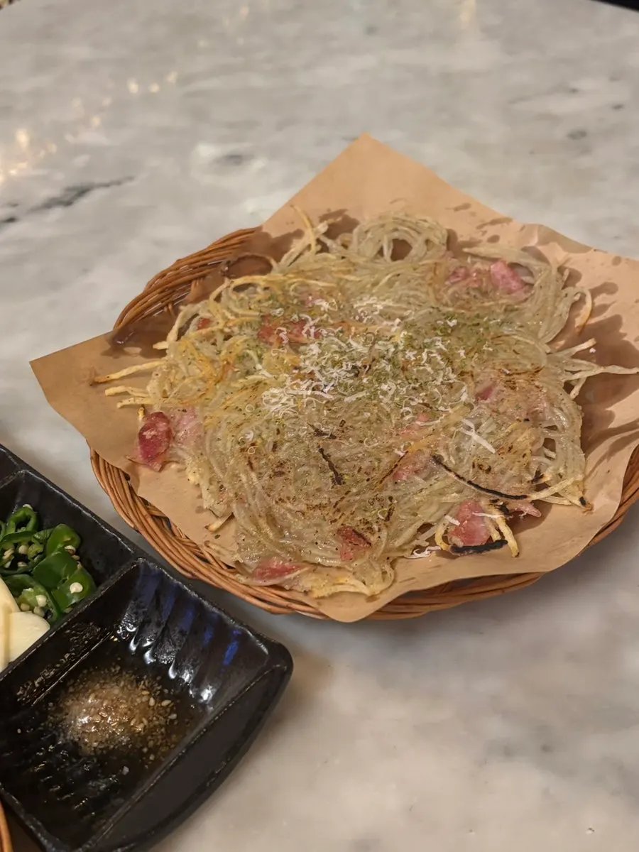 Shredded-potato jeon with cheese and toppings