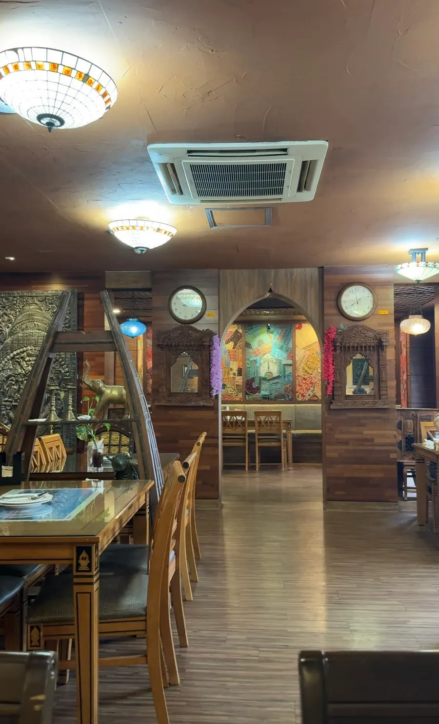 Interior of Namaste Dongmyo Branch decorated with exotic ornaments