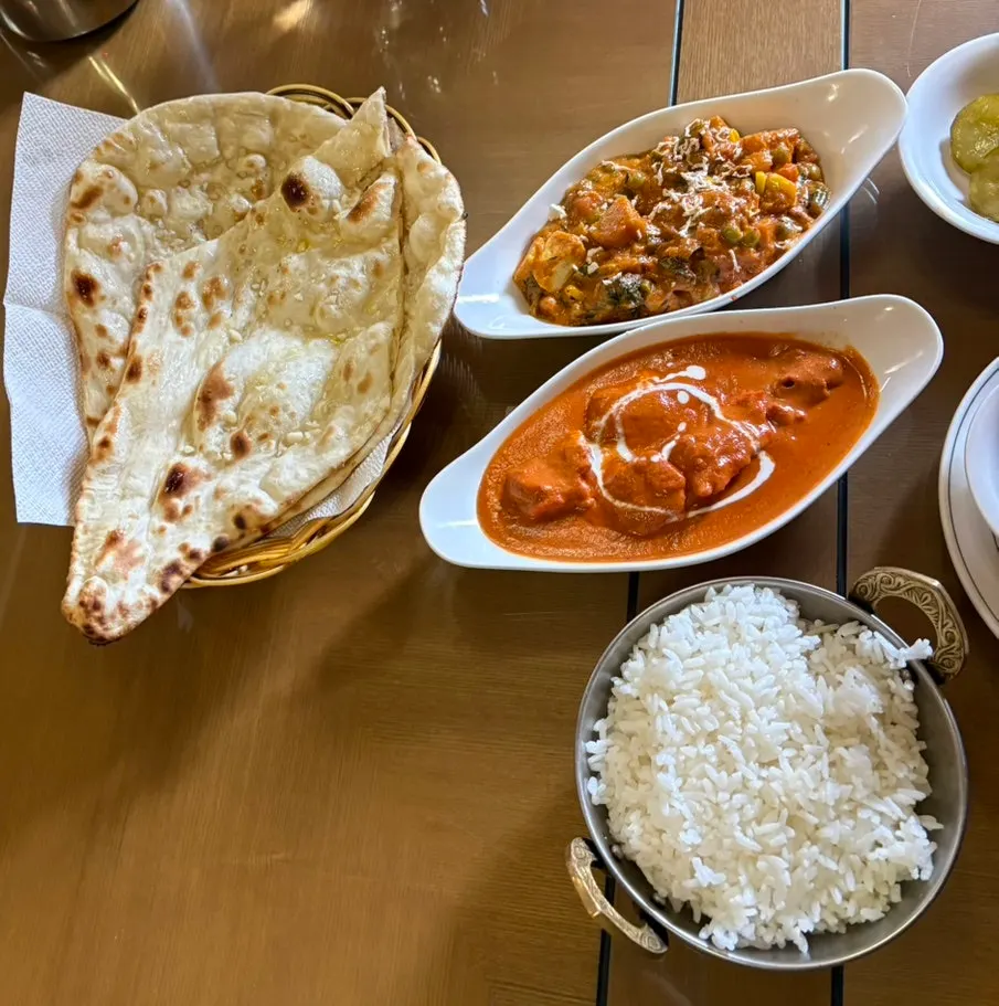 Rich chicken makhani curry topped with cream