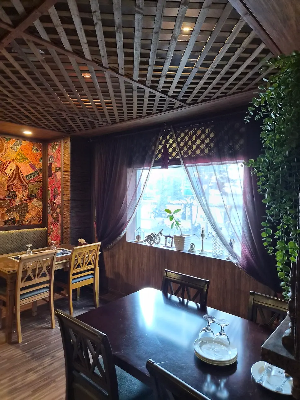 Restaurant interior decorated with Indian-style props