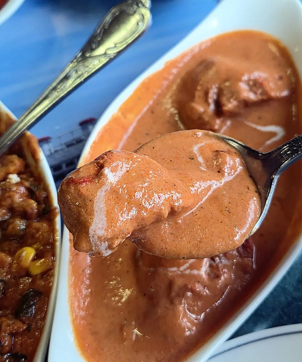 Vegetable curry with potato, corn and peas