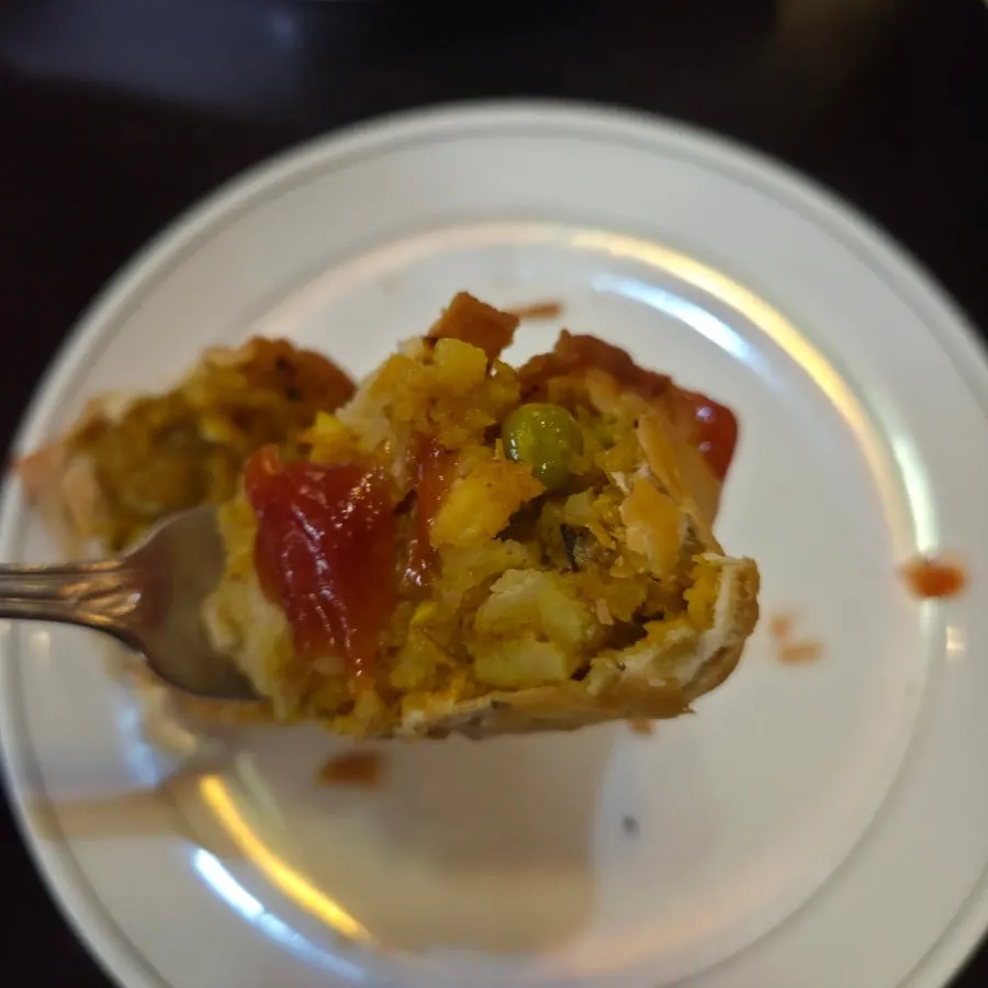 Cross-section of a samosa showing the packed filling