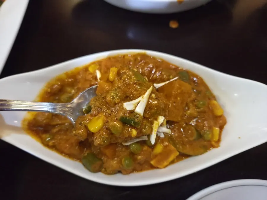 A bowl of vegetable curry, tried for the first time