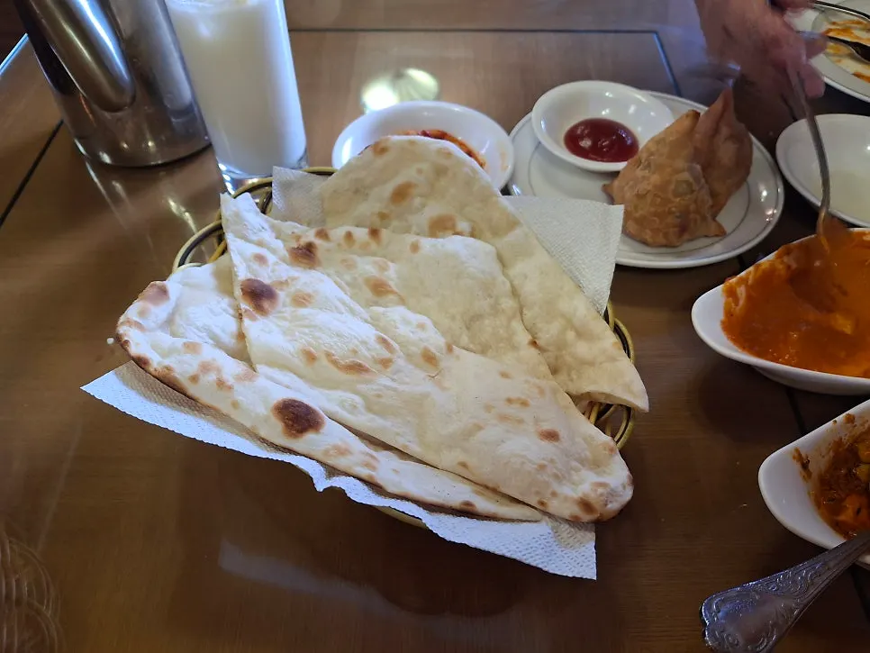 Photo of garlic-studded garlic naan