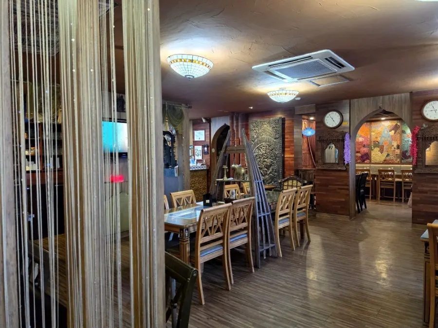 Interior decorated in Indian and Nepalese style with mood lighting