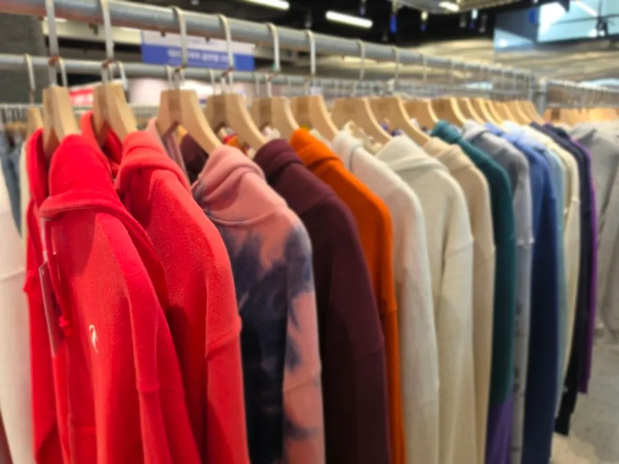 Corner of the store with vintage pants hanging