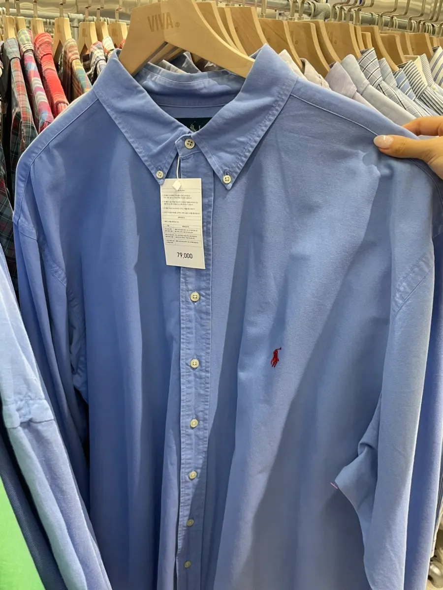 Rack of vintage shirts and knits for fall and winter