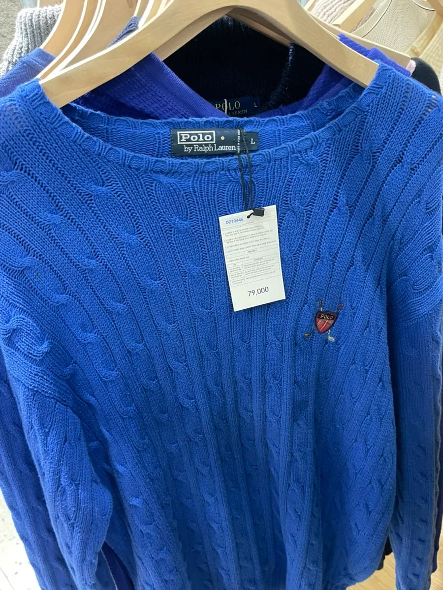 Holding up a vintage knit