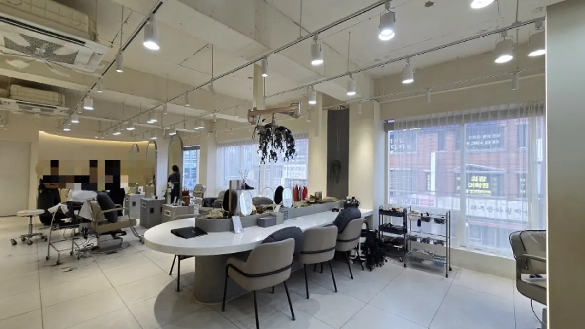 Naturally lit seating area inside Chamer hair salon