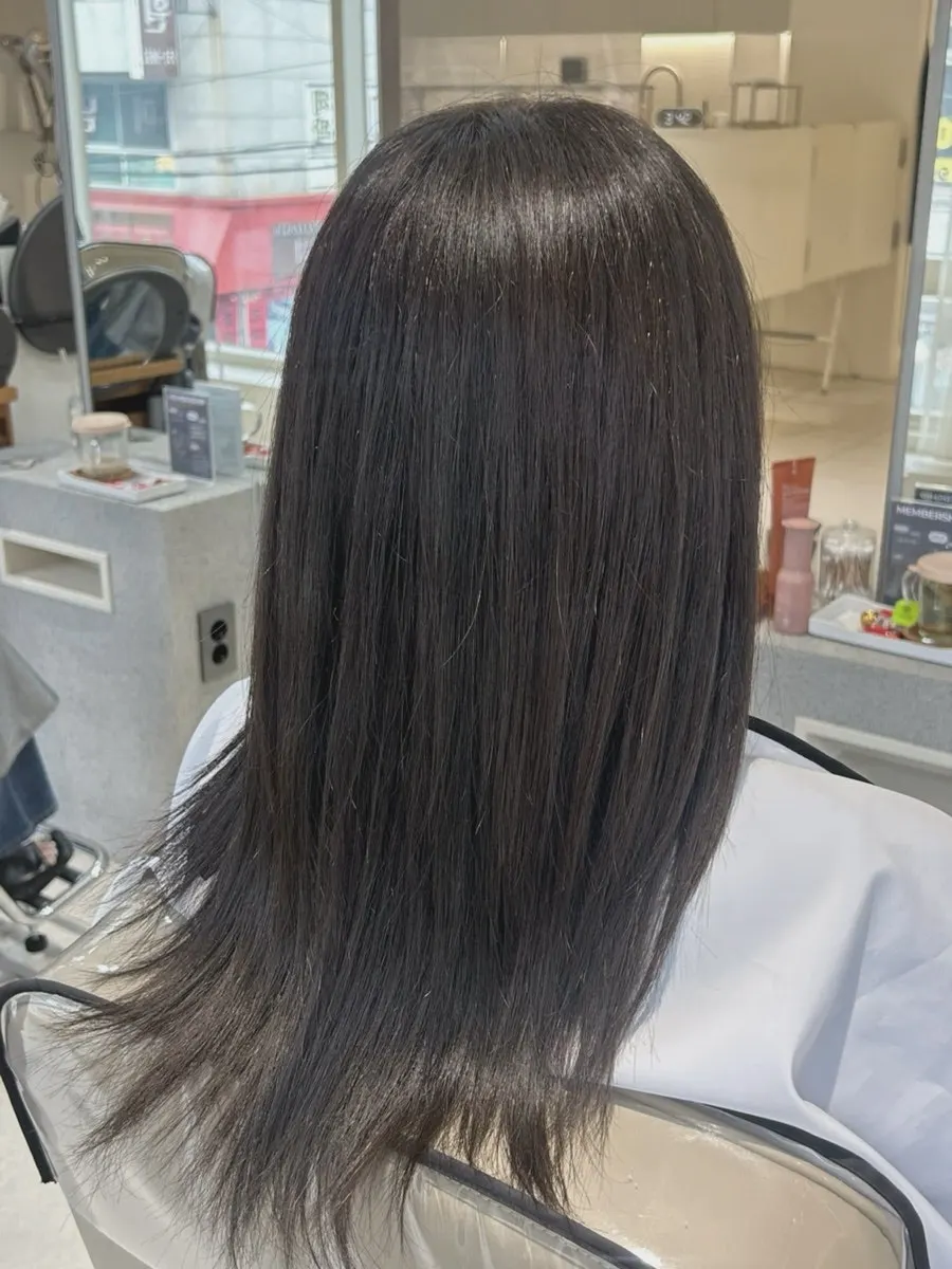 Soft muted brown hair color