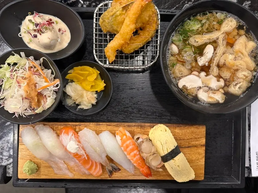 Dining area divided by table at Moshi Moshi Sushi