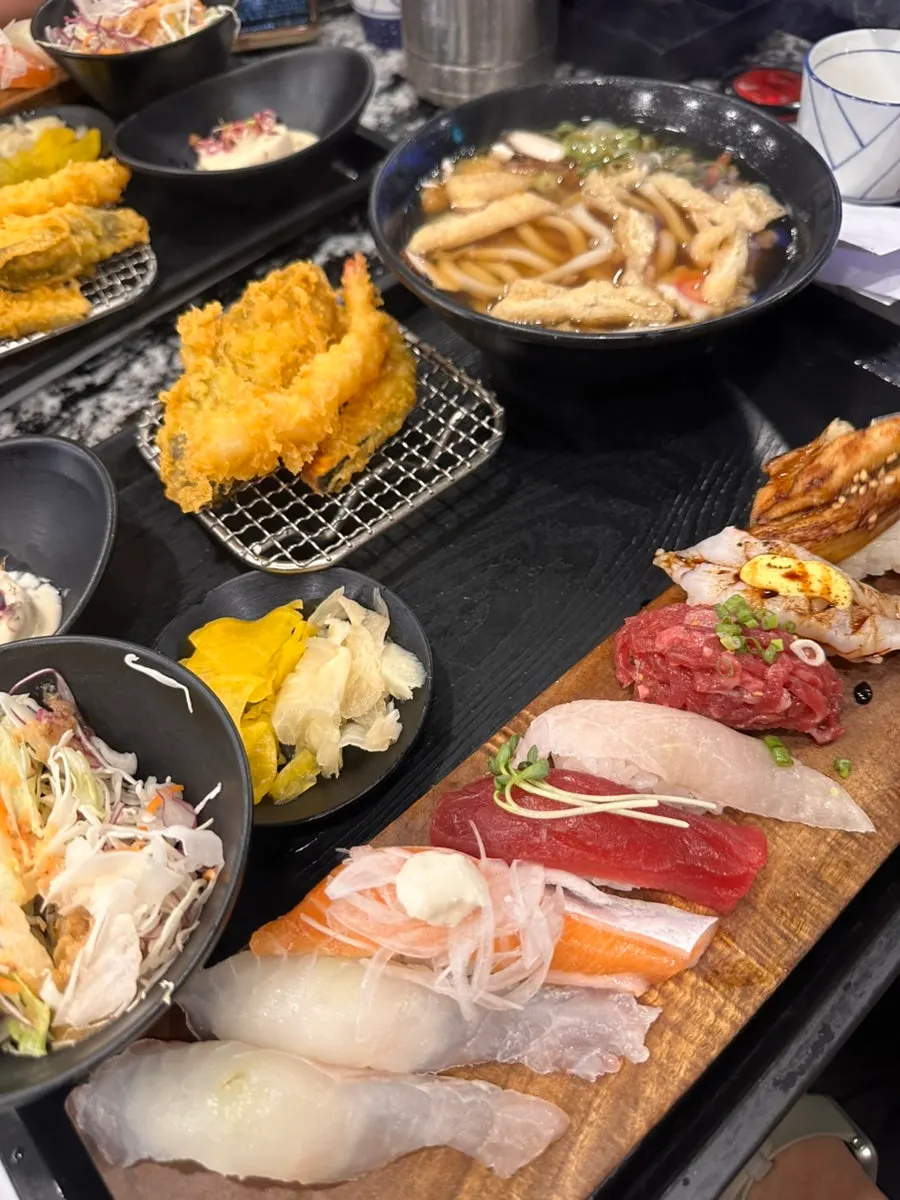 Eight pieces of sushi with thick cuts of fish
