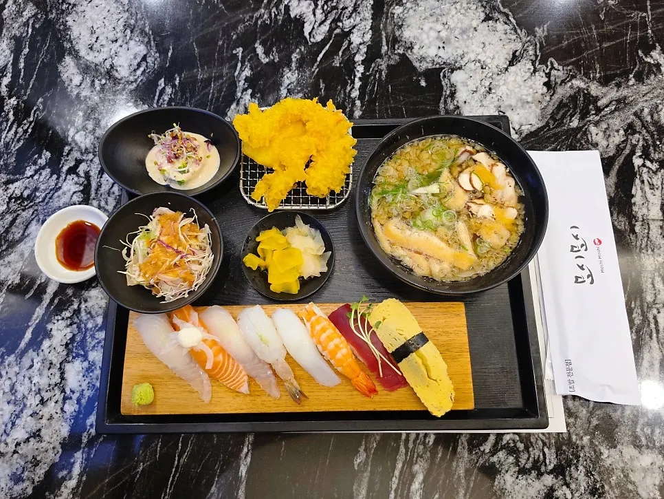 2 pieces of shrimp sushi given for a receipt review