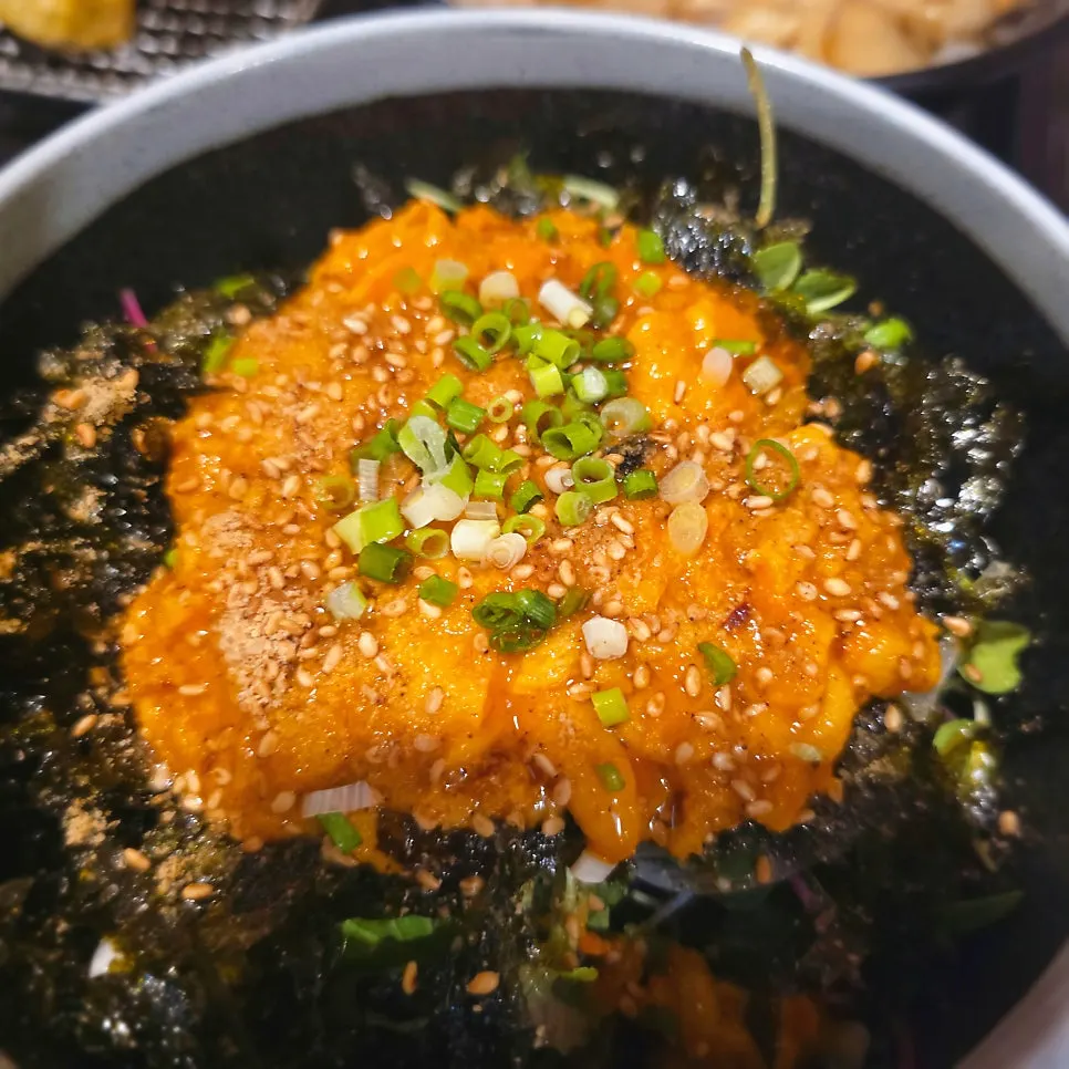 Bibimbap topped with fragrant sea squirt